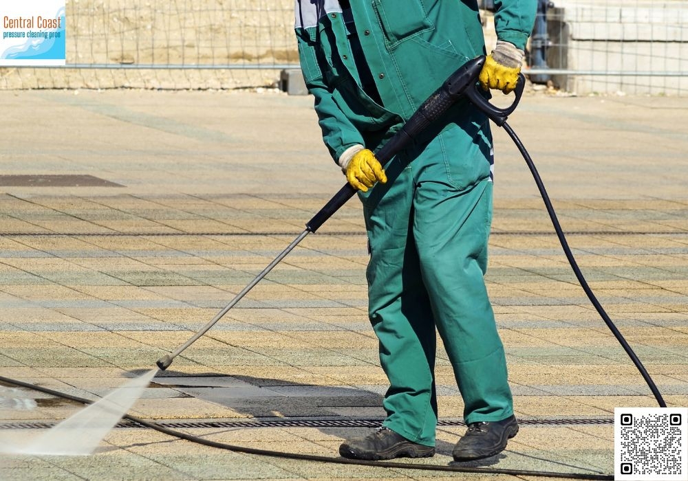 Who provides sanitation services post-flooding in Terrigal?